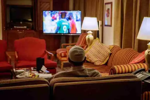 Photos Of President Buhari Watching The Super Eagles Match Against Angola